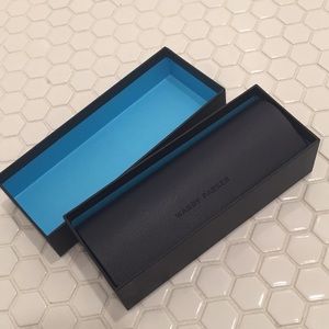 Warby Parker glasses case in navy blue